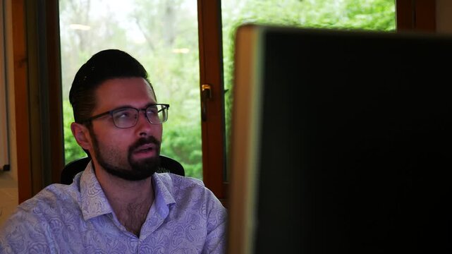 A Man is Laid off from his job via email