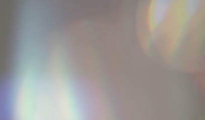 Obraz premium Rainbow prism light leak overlay dark background colorful bokeh glow lens flare effect