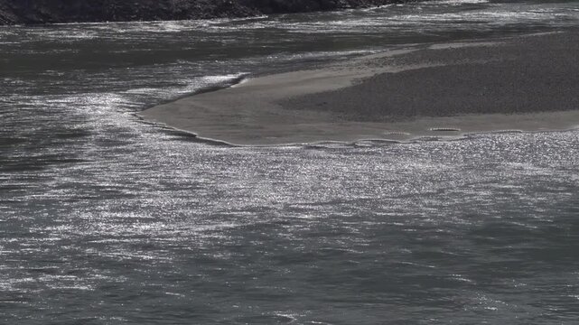 Potamology . Great river. The Jinshajiang River is the name of upstream of the Yangtze, the largest river in China and Asia. River ripples in the mountains, alluvian island