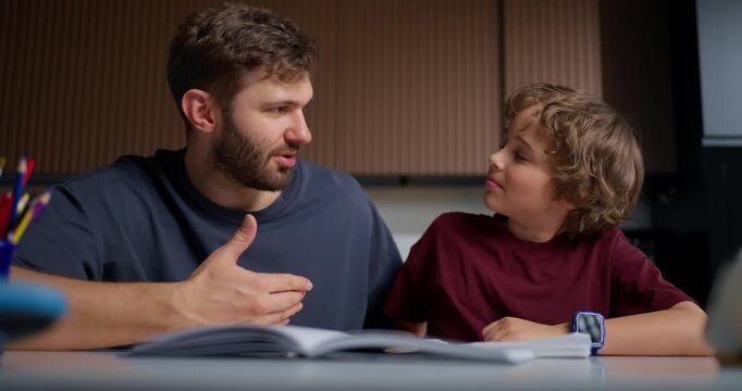 Male Parent Softly Fosters Meaningful Dialogue While Exchanging Meaningful Looks And Support