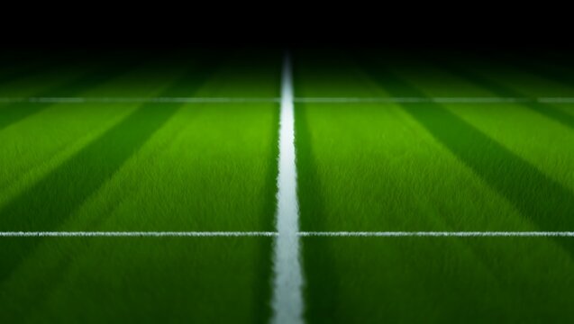 Detailed view of white painted t-junction lines on a green professional soccer field with football, competition