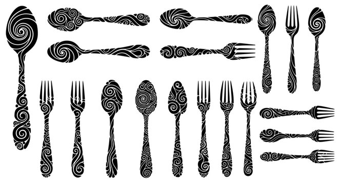 Collection of vintage ornate metal cutlery.