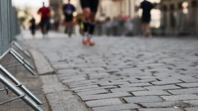 Runners Warm Up Before City Marathon Race With A Low Angle View Focusing On Legs