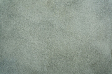 matte texture with mottled green gray (often called agave, sage, or cement) tone. contemporary industrial-chic interior © Wiratri
