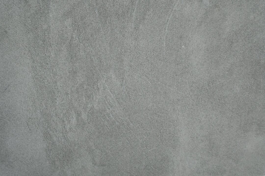 concrete wall background. light gray surfacethat resembles concrete or plaster, often used as a backdrop or interior design or photography