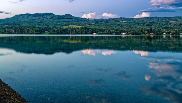 Panorama of the reflections in the lake at dusk at Tyhee Lake Provincial Park, British Columbia, Canada