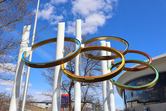 MONTREAL QUEBEC CANADA 04 26 2026: The Olympic rings blue, yellow, black, green, and red on a white background symbolize the union of the five inhabited continents