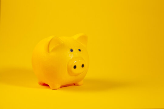bank piggy bank on yellow background