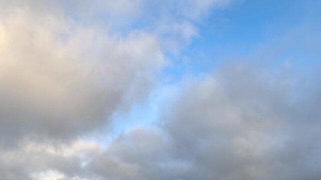 Orange stratocumulus clouds in the sky at dawn