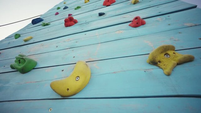 Close-up of climbing exercise wall with grips