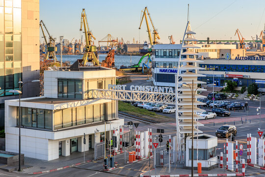Port constanta bustling maritime hub with cranes and cargo ships at sunset. May 3, 2025 Constanta Romania