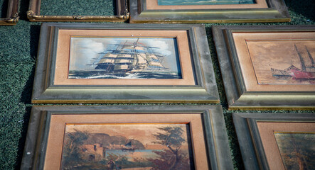 sailing ship pictures at a boot sale © rusty elliott