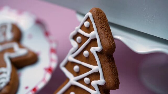Close Up Christmas Tree Shaped Cookie on Table.Close-up shot of a Christmas tree shaped cookie resting on a table.