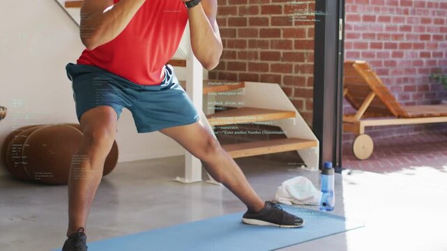 Man starting from wide stance, stepping left into lunges and squats on blue mat for fitness
