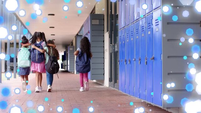 School girls leaving class and walking corridor, lockers backpacks with bokeh overlay intensifying