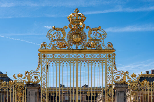 Royal gate at the palace of Versailles with blue sky background