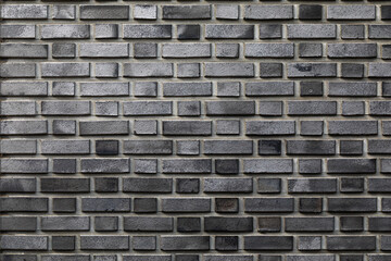 Fototapeta premium Modern dark grey brick wall texture background with elegant finish