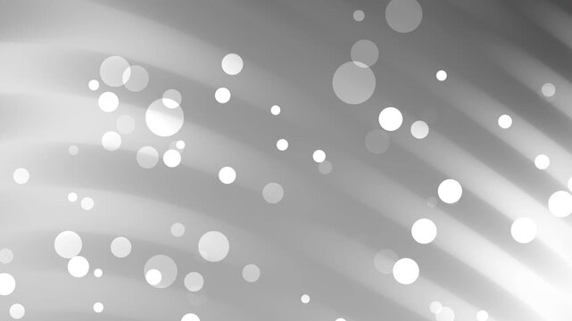 Bokeh black and white gradient background circles on a gray background suitable for design projects, festive concepts, or modern backgrounds in visual media.