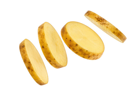 Fresh sliced potato pieces isolated on white background, showcasing natural texture and clean composition ideal for food, agriculture, and ingredient concepts.