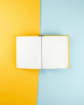 Open book on colorful background