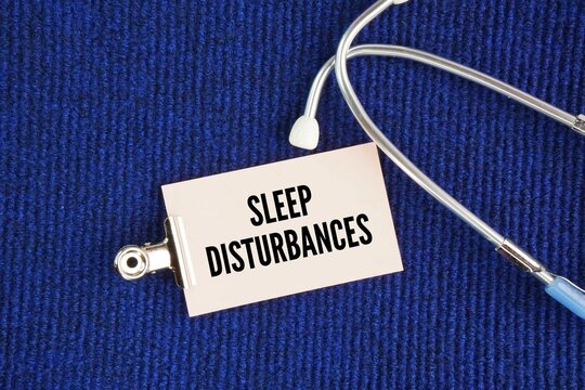 Stethoscope and paper with the word sleep disturbances. conditions that disrupt normal sleep patterns, affecting the quality, timing, or amount of sleep, resulting in daytime distress