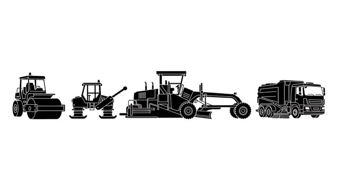 Construction vehicles in silhouette.