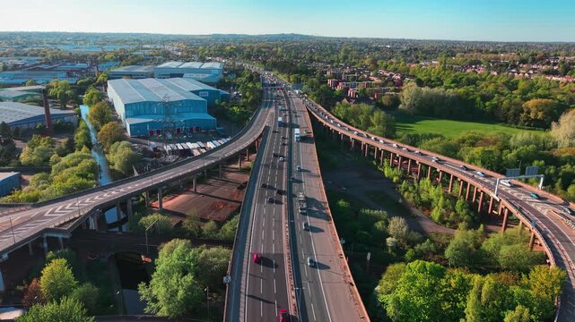 Aerial Static Drone View of M6 Elevated Motorway Birmingham UK &mdash; Traffic Flow Over City Viaduct