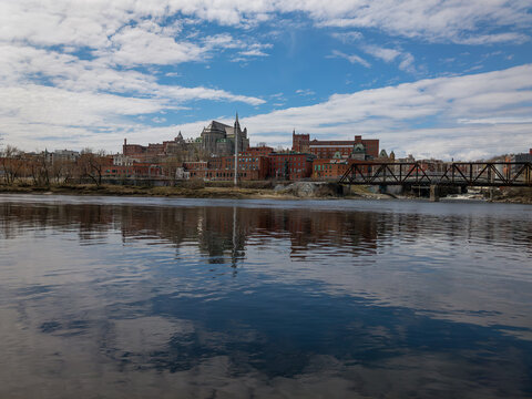 Downtown Sherbrooke Quebec cityscape with river and cloudy sky