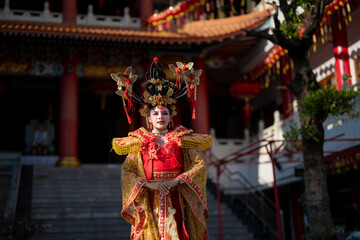 Fototapeta premium Chinese performer wearing traditional opera costume at temple
