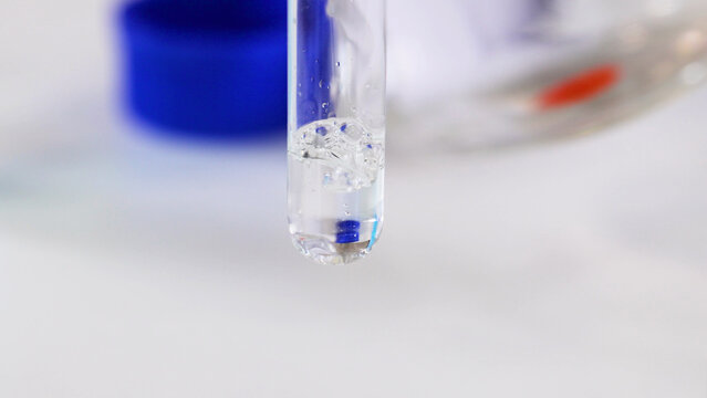 Close Up of Bubbling Chemical Reaction in a Glass Test Tube
