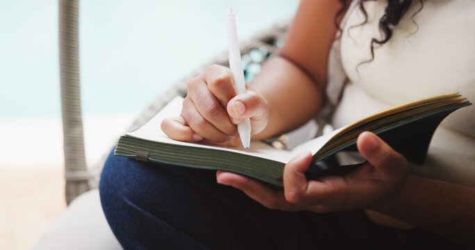 Freelancer, writing and hands with notebook, home and plan for creative project or story preparation. Author, closeup and person with journal for novel, remote work and brainstorming with notes