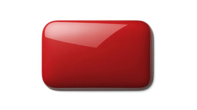 A smooth rectangular red button with a glossy finish and a soft white highlight reflection
