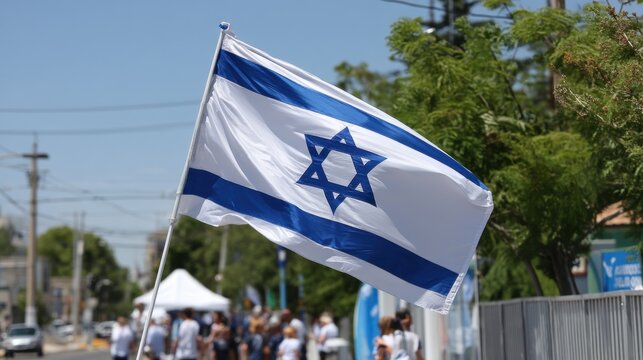 The Israeli flag displayed during Independence Day celebrations, showcasing national pride and unity. 