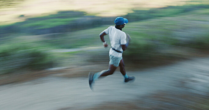 Exercise, black man and running in woods with motion blur, body health and cardio endurance workout. Person, outdoor and fast runner in forest for fitness, training and practice sprint with speed