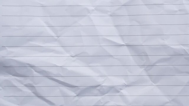 Blank crumpled lined notebook paper texture background stop motion