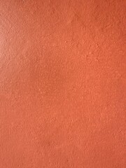 Fototapeta premium Red grunge banner, Abstract stone background, The texture of the stone wall, Close-up light red rock backdrop.