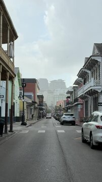 Walking tour in French Quarter, New Orleans near Bourbon Street in Louisiana