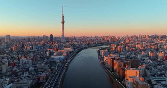 TOKYO JAPAN. Aerial view 4k video by drone of Tokyo sky tree in Tokyo city Japan on sunrise.