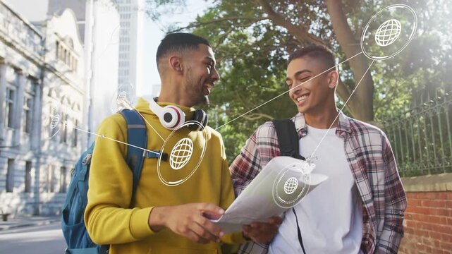 Vertical video: Pointing men yellow hoodie walking campus, checking map and phone AR confirming way