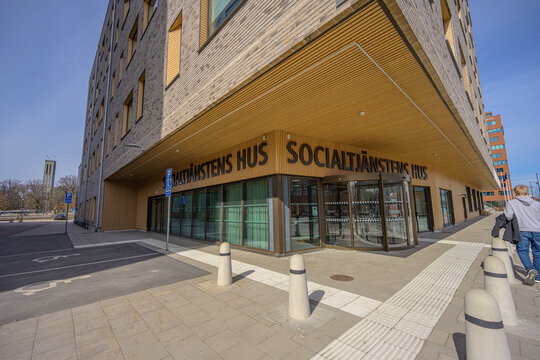 V?ster?s, Sweden - April 18 2026: Contemporary municipal building entrance with social services signage and accessible urban infrastructure.