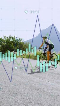 Vertical video: Cyclist pedaling mountain road, data charts overlaying rider updating training data