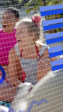 Vertical video: Two girls sitting frames changing grid HUD nodes becoming bars over kids for tech