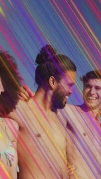 Vertical video: Group linking arms laughing under sky, pan sweeping overlay over bikinis for ads