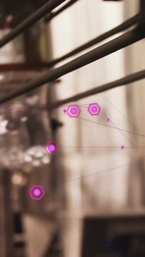 Vertical video: Camera shifting left-up, magenta nodes linking across bottle right, mapping stock