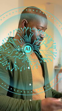Vertical video: Mid adult man tapping tablet and activating teal AI overlay in front, reviewing