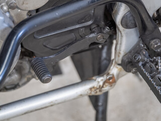 Fototapeta premium Close-up of a motorcycle gear shift lever.