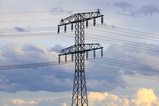 High voltage transmission tower against cloudy sky in Germany