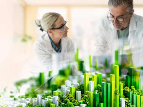 Scientists collaborating on sustainability and green energy concept
