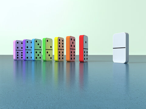 Colorful dominoes in a row and one blank white domino standing apart