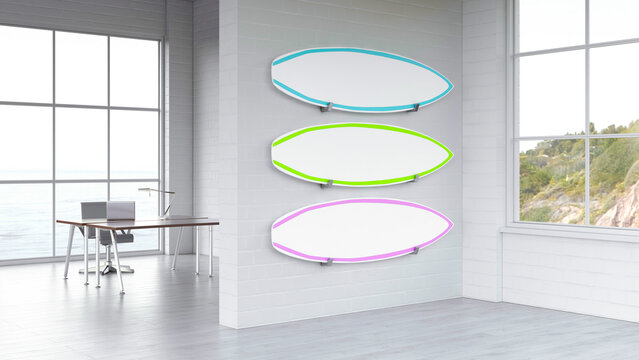 Modern office interior with three surfboards on the wall